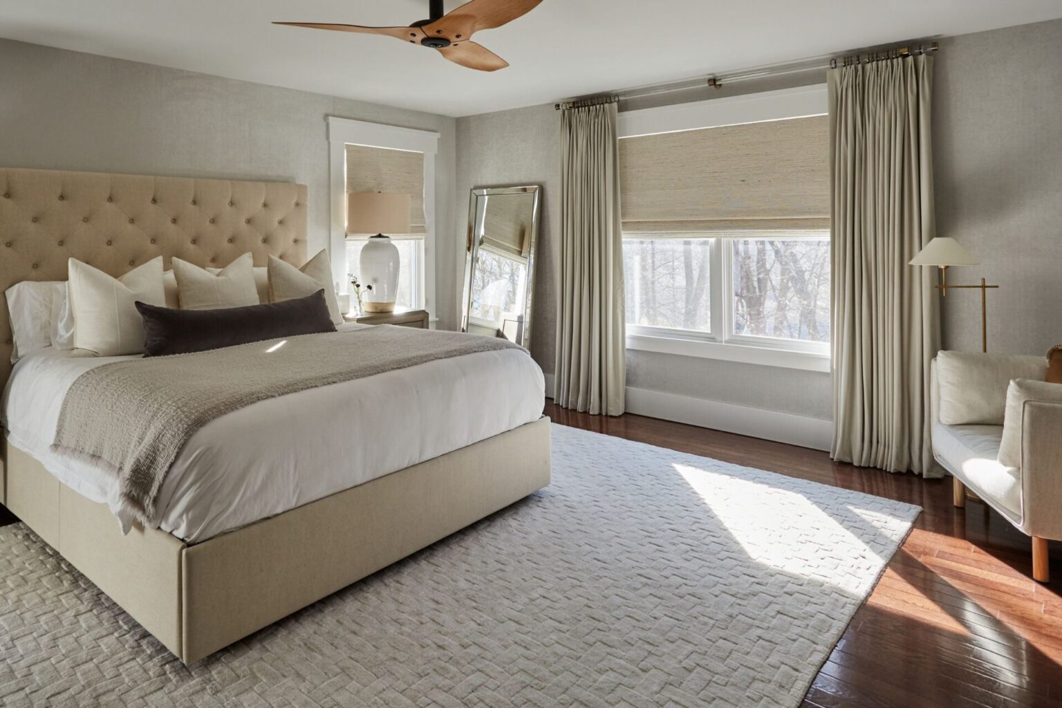 Custom drapes in deep grey installed in a bed room in Roseland NJ