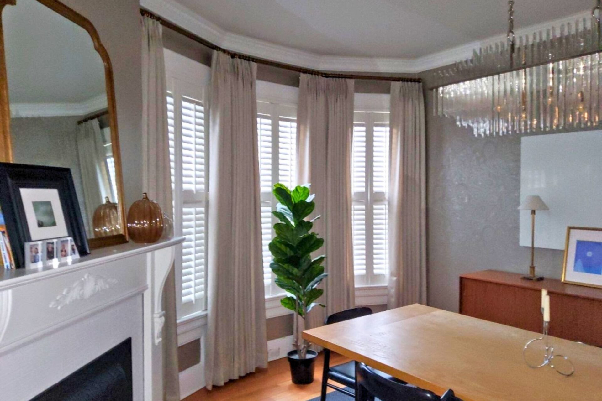 Bow window custom drapes in a living room in Montclair, NJ