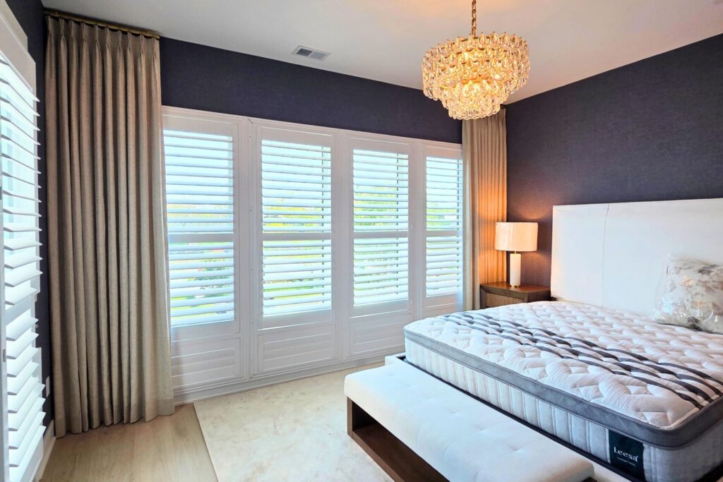 Asbury Park Custom Drapes Bedroom with light beige curtains on rods with rings