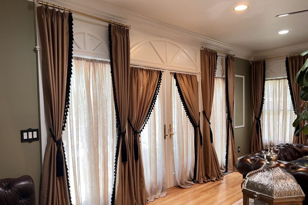 Custom white sheers and gold drapes with trim Scarsdale, NY