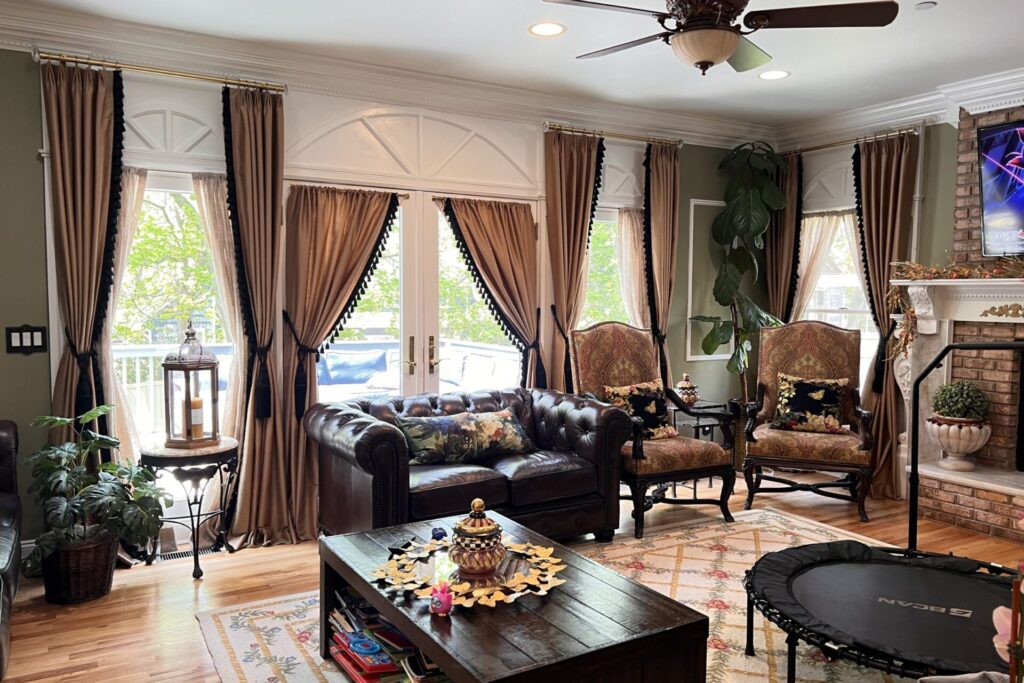 Custom white sheers and gold drapes with trim Scarsdale, NY living room